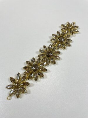 Accesoriu auriu cu pietre